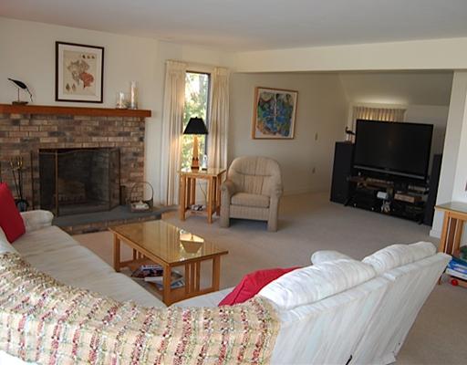 1275 Corn Neck Road Block Island, RI 02807 - Photo 6 of 15 Exterior Front. Living Room with woodburning fireplace