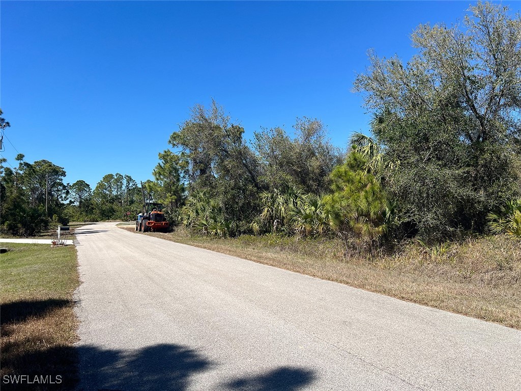 Fanning St Port North Port, FL 34288 - Photo 4 of 5 a view of a road with a building in the background