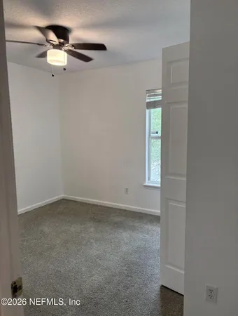 a view of a kitchen with a sink