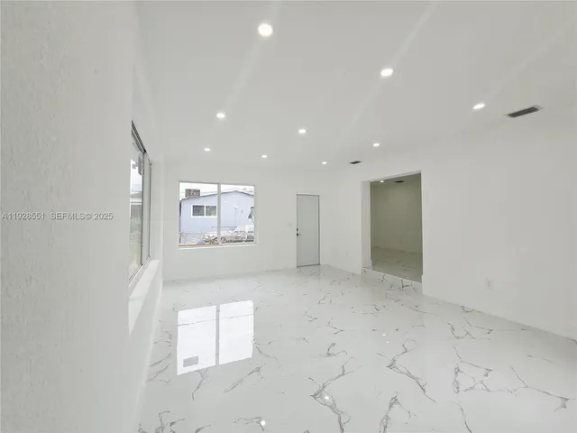 an empty room with a workbench