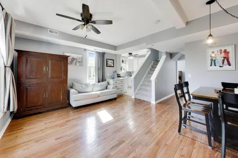 a view of livingroom with furniture and wooden floor