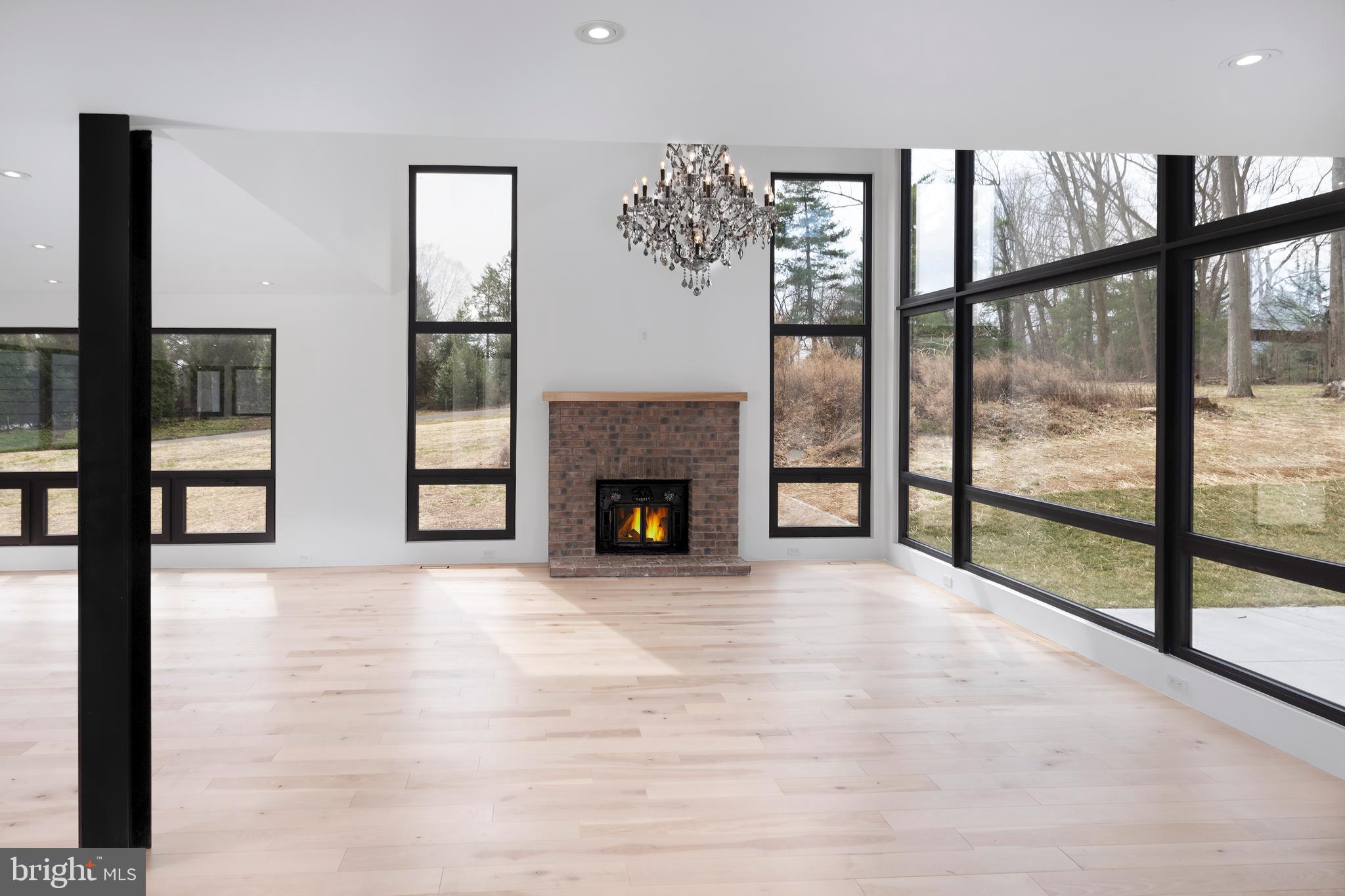 3146 Mill Road Doylestown, PA 18902 - Photo 11 of 33 a view of an empty room with window and fire place