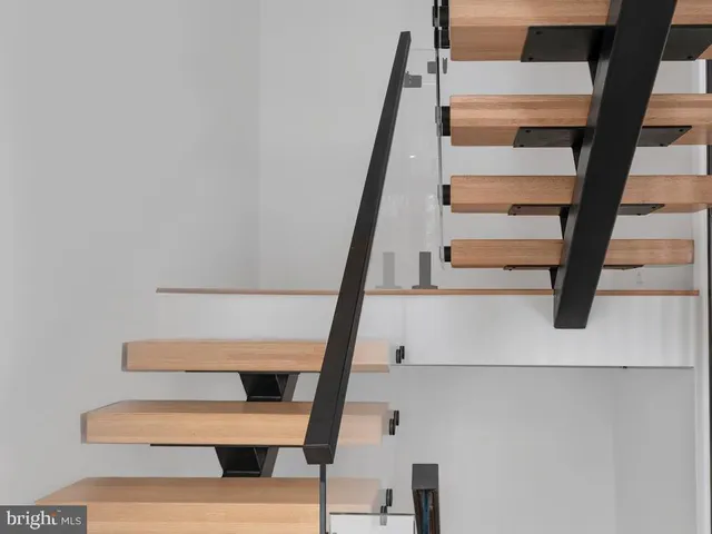 a view of a room with a large window