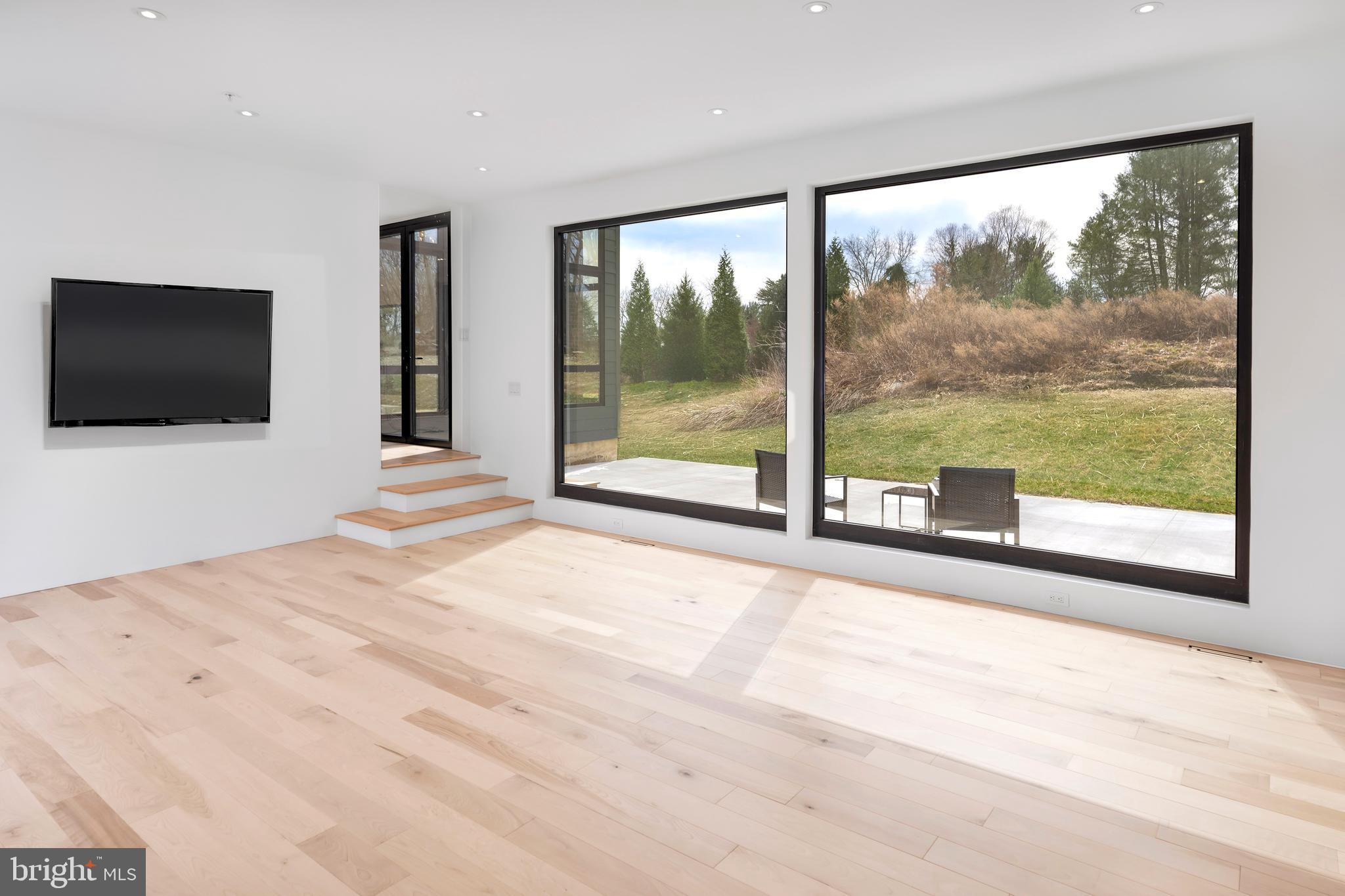 3146 Mill Road Doylestown, PA 18902 - Photo 15 of 33 a view of a livingroom with furniture and front door