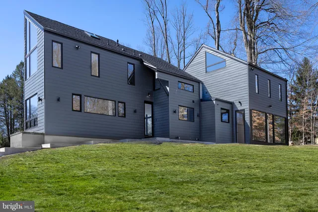 a brick house with a yard