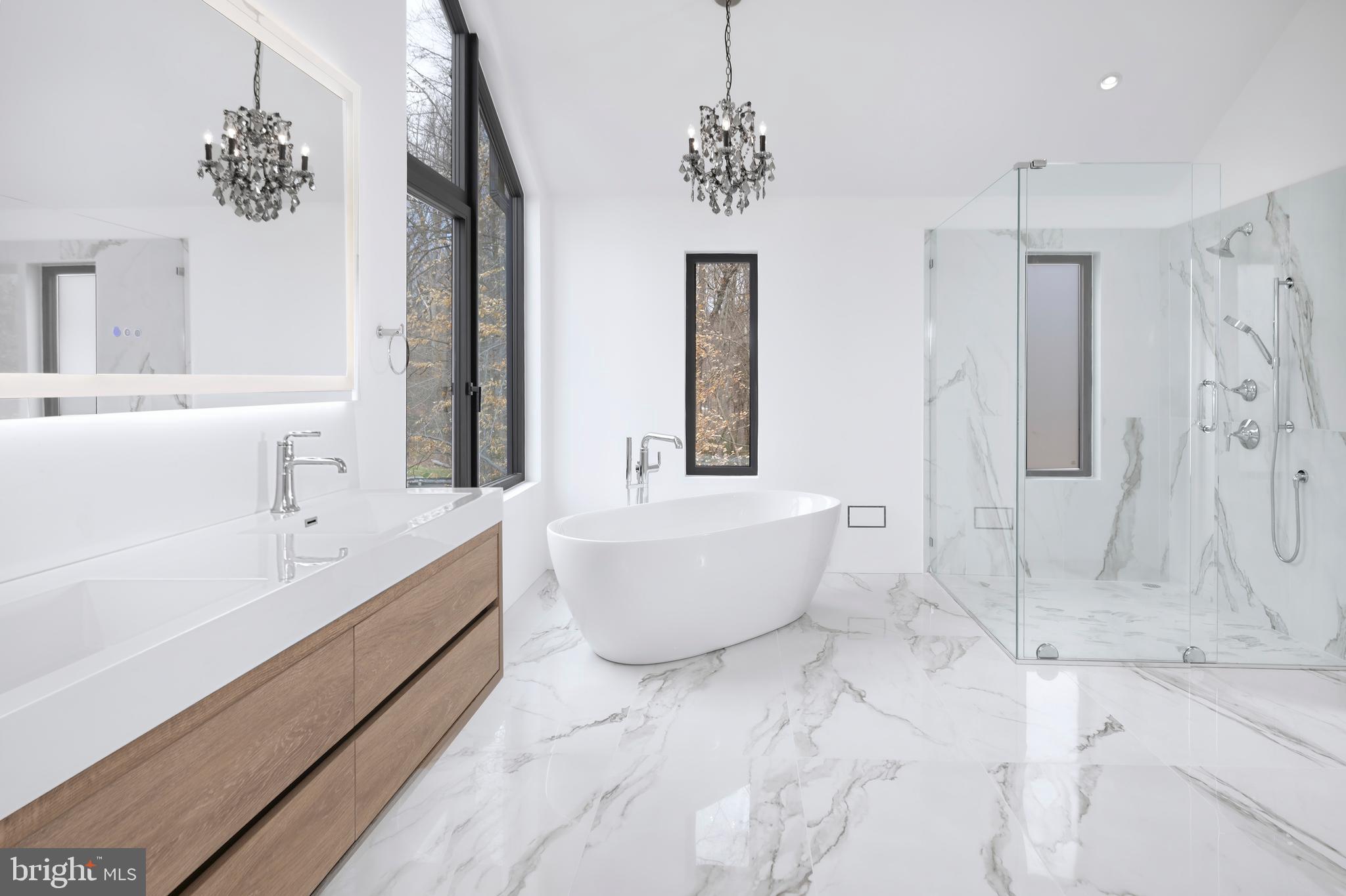 3146 Mill Road Doylestown, PA 18902 - Photo 21 of 33 a bathroom with a bathtub and shower