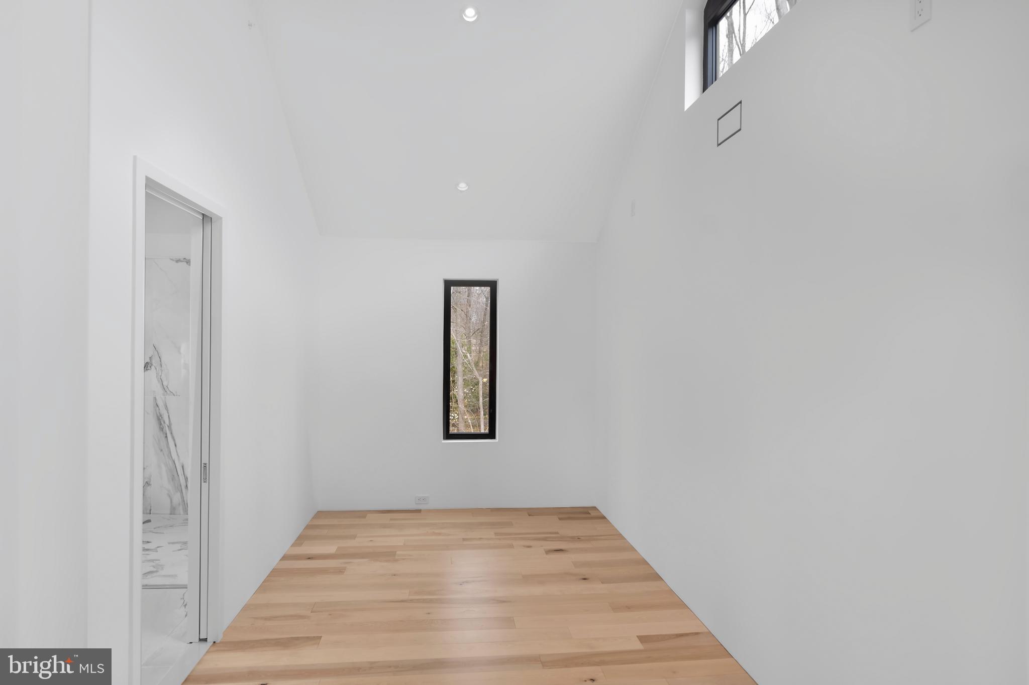 3146 Mill Road Doylestown, PA 18902 - Photo 23 of 33 a view of a room with a window and wooden floor