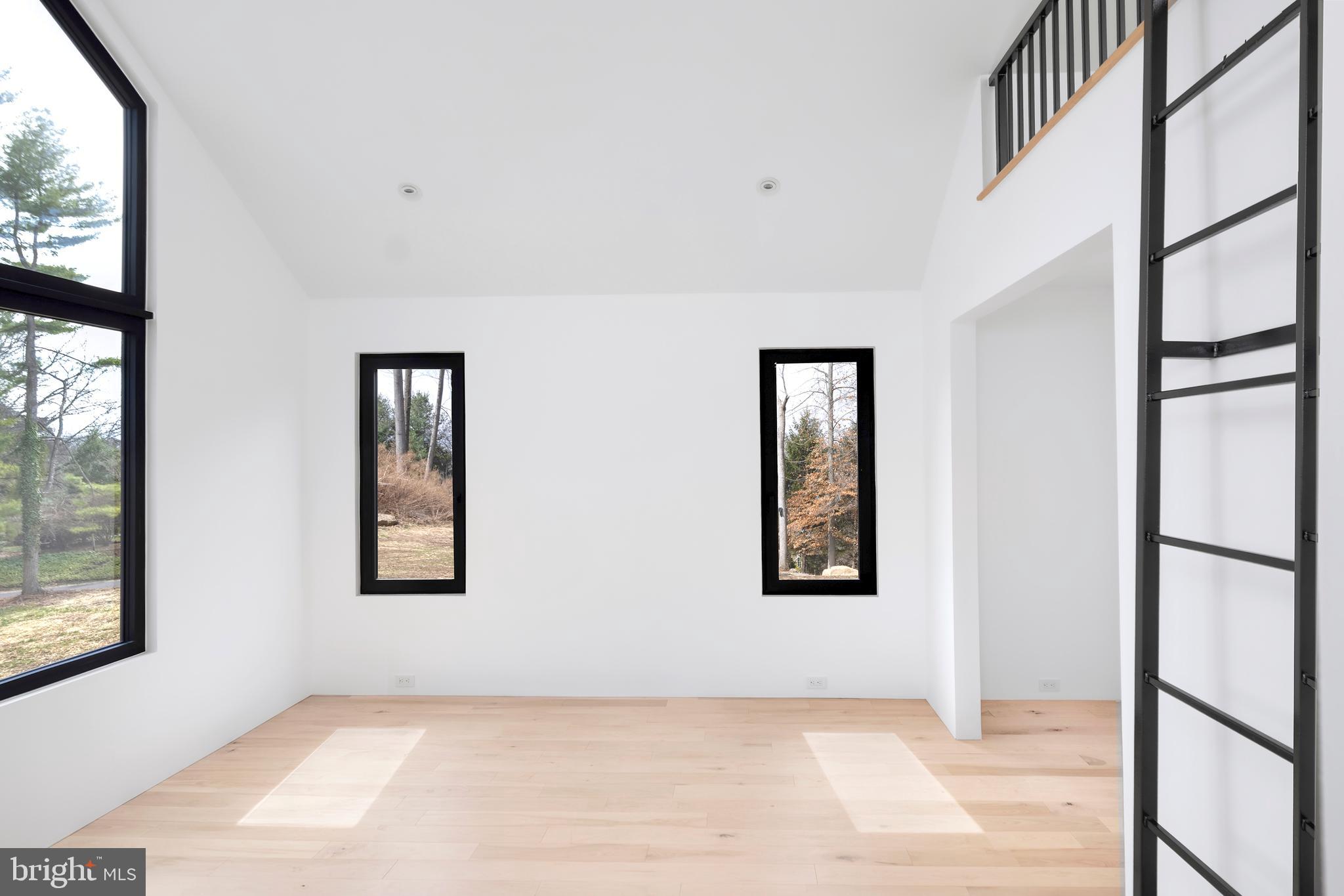3146 Mill Road Doylestown, PA 18902 - Photo 26 of 33 a view of an empty room with windows
