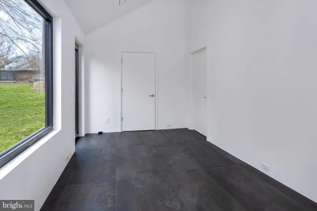 an empty room with windows