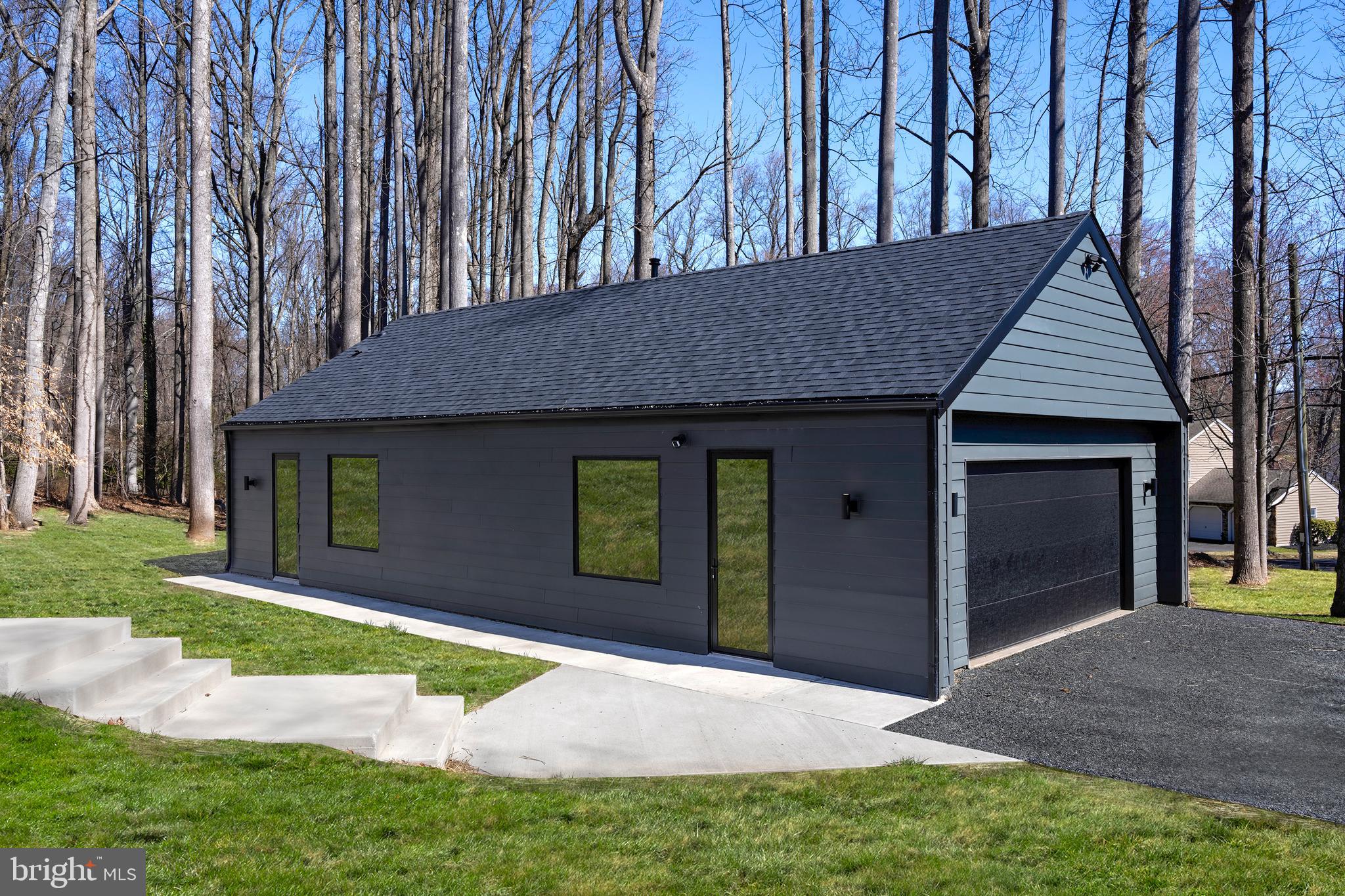 3146 Mill Road Doylestown, PA 18902 - Photo 5 of 33 a front view of a house with garden