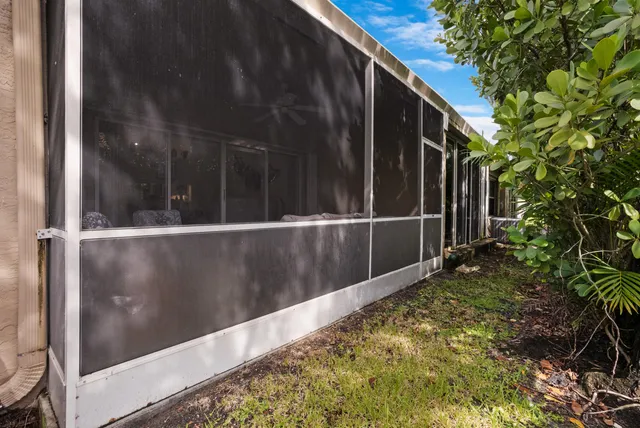 a view of backyard with tub
