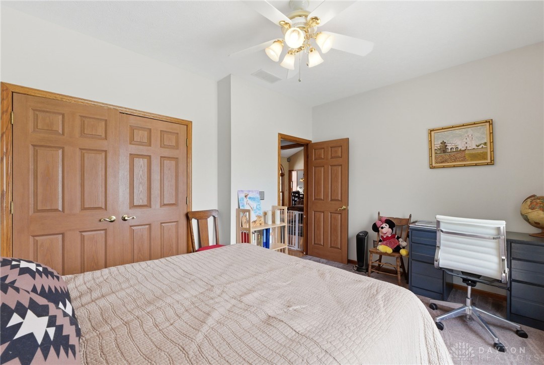 1540 Jasper Road Xenia, OH 45385 - Photo 35 of 91 This cozy bedroom offers a functional layout with ample storage and inviting details.