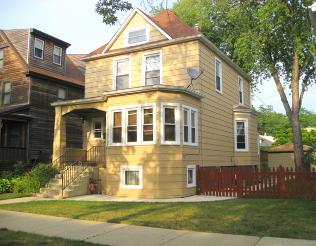 4241 North Springfield Avenue Chicago, IL 60618 - Photo 1 of 19 a front view of a house