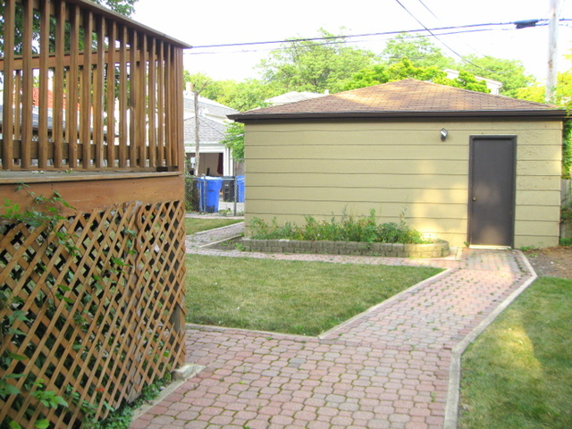 4241 North Springfield Avenue Chicago, IL 60618 - Photo 16 of 19 a view of a back yard of the house