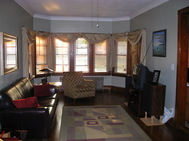 4241 North Springfield Avenue Chicago, IL 60618 - Photo 3 of 19 a living room with furniture and a window