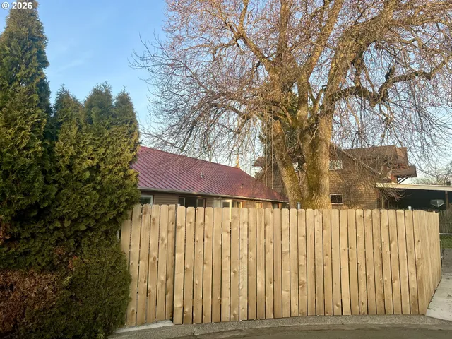 a view of entrance gate of a house