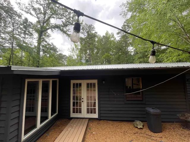 a backyard of a house with lots of green space