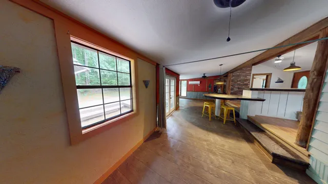 a room with furniture and a window