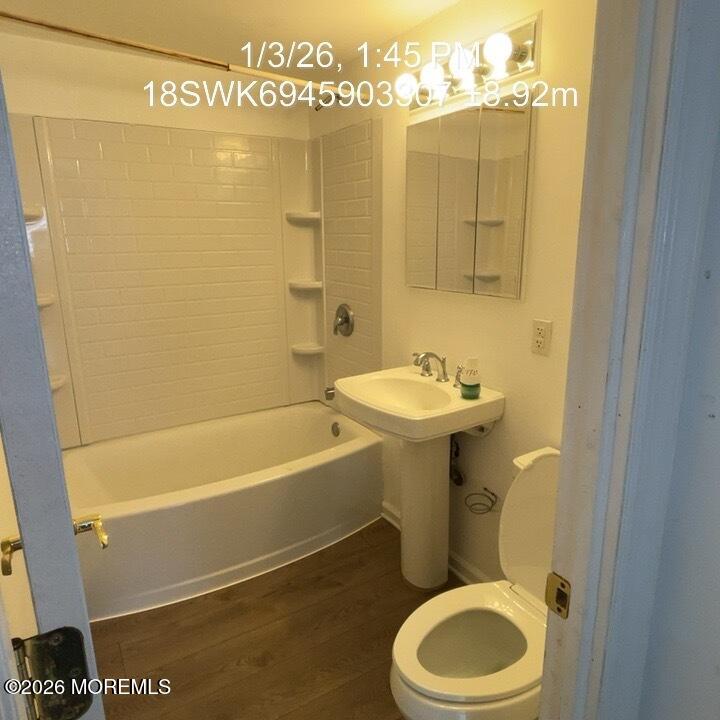 115 Bonita Road Waretown, NJ 08758 - Photo 11 of 18 a bathroom with a sink a toilet and shower