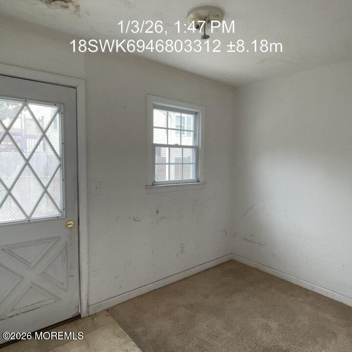 115 Bonita Road Waretown, NJ 08758 - Photo 2 of 18 an empty room with a window