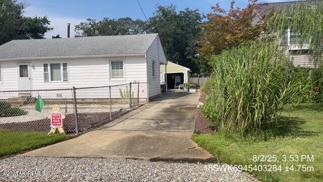 115 Bonita Road Waretown, NJ 08758 - Photo 3 of 18 a view of a house with backyard and sitting area