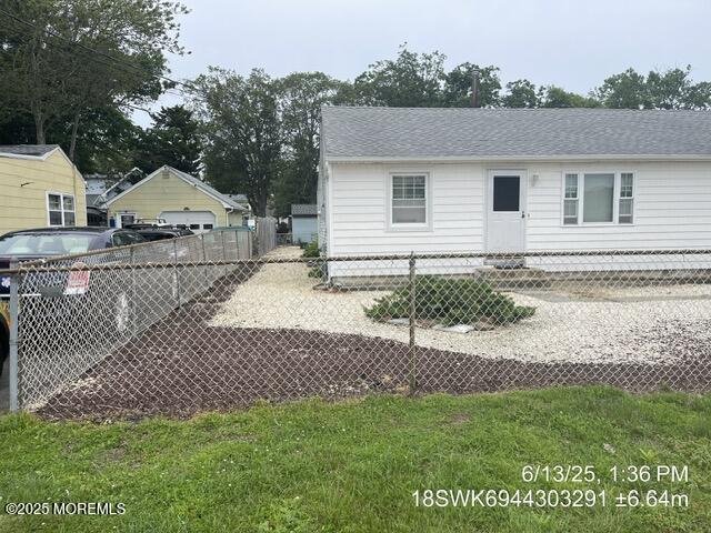 115 Bonita Road Waretown, NJ 08758 - Photo 4 of 18 a view of a house with a yard and fence
