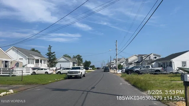 a view of a water fountain in front of a house