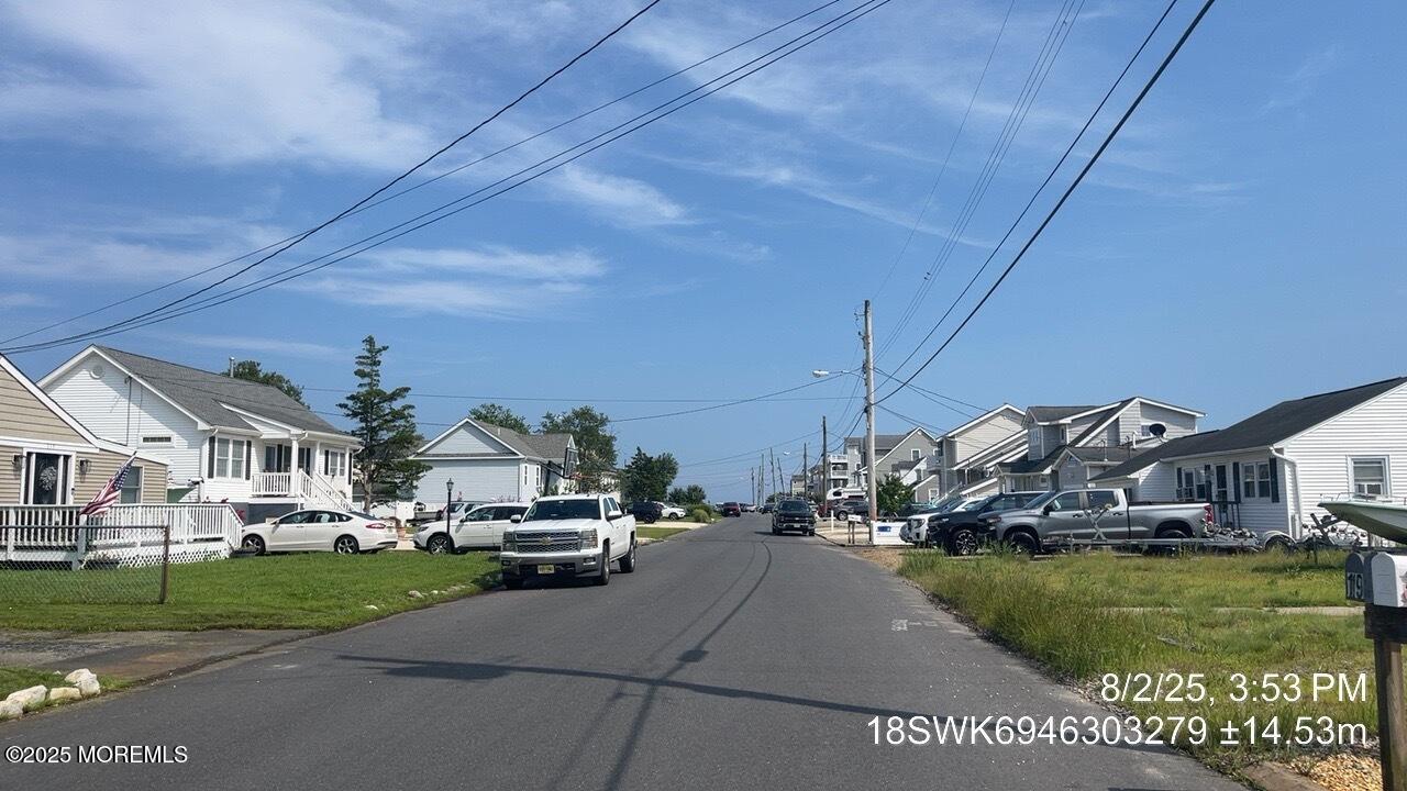 115 Bonita Road Waretown, NJ 08758 - Photo 7 of 18 a view of a water fountain in front of a house
