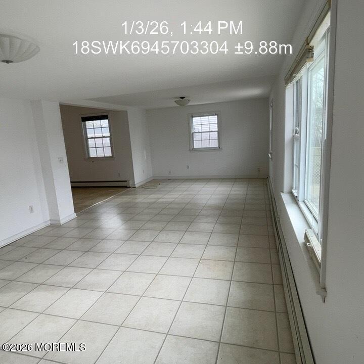 115 Bonita Road Waretown, NJ 08758 - Photo 8 of 18 an empty room with windows