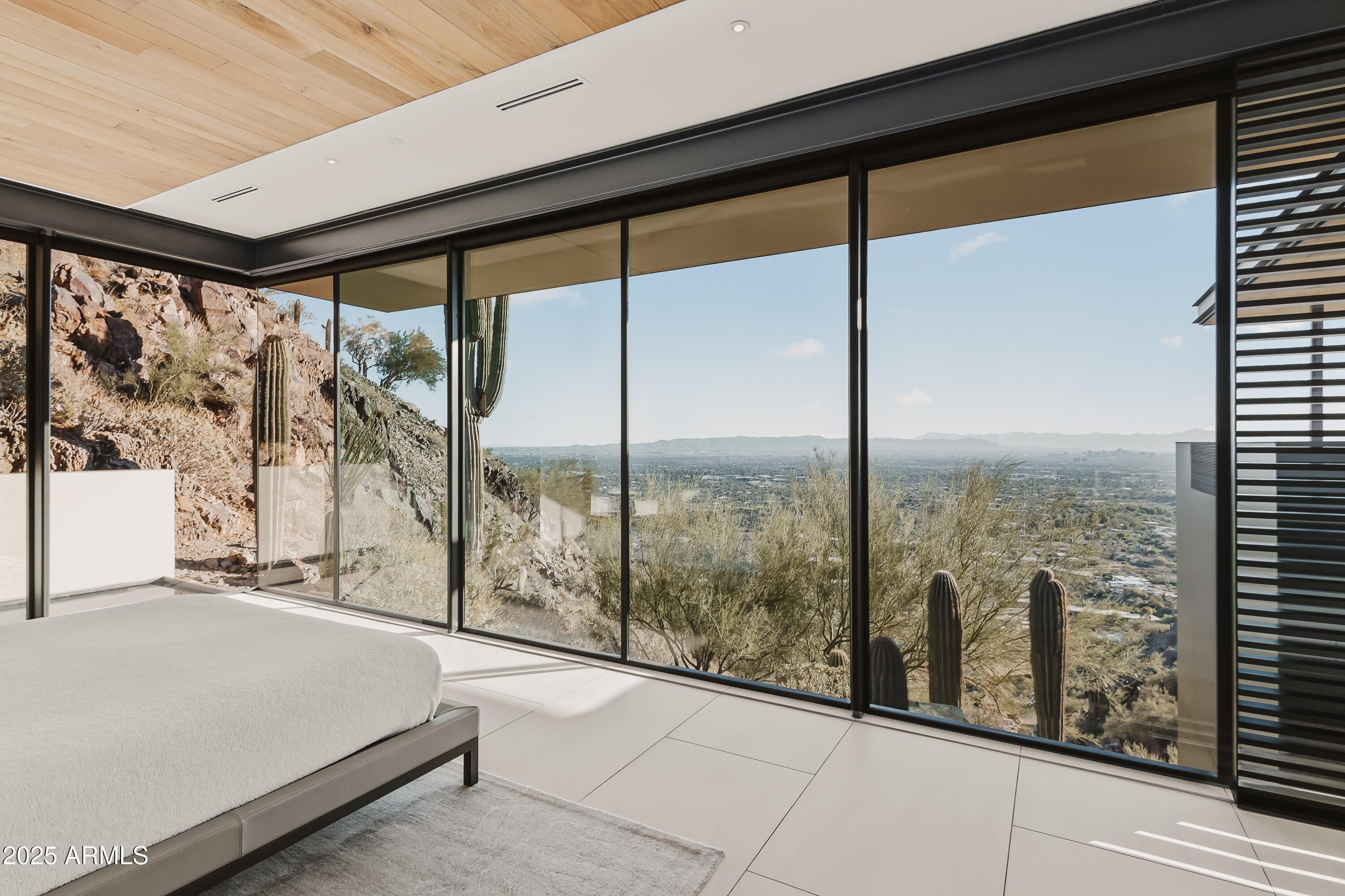 4301 East Upper Ridge Way Paradise Valley, AZ 85253 - Photo 17 of 53 a room with water view and large windows