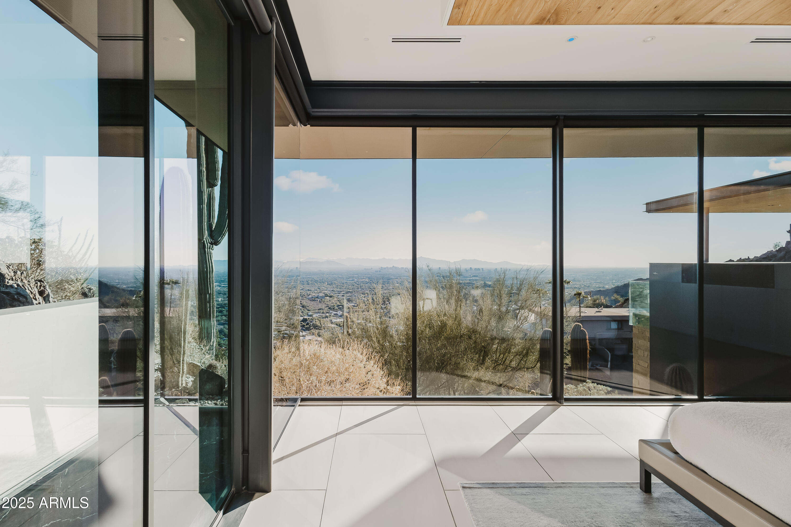 4301 East Upper Ridge Way Paradise Valley, AZ 85253 - Photo 18 of 53 a bathroom with a glass door
