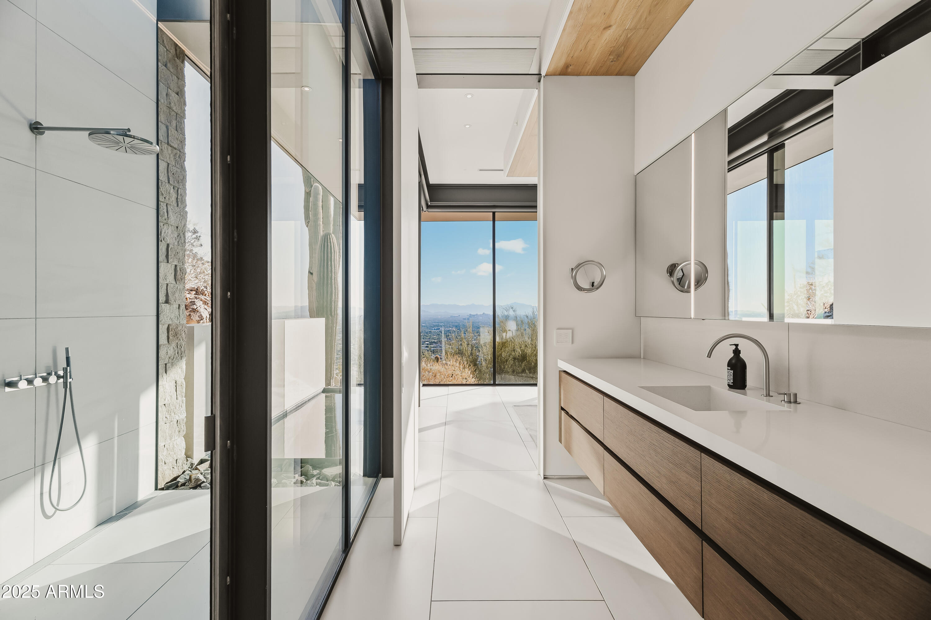 4301 East Upper Ridge Way Paradise Valley, AZ 85253 - Photo 24 of 53 a bathroom with a sink and a mirror