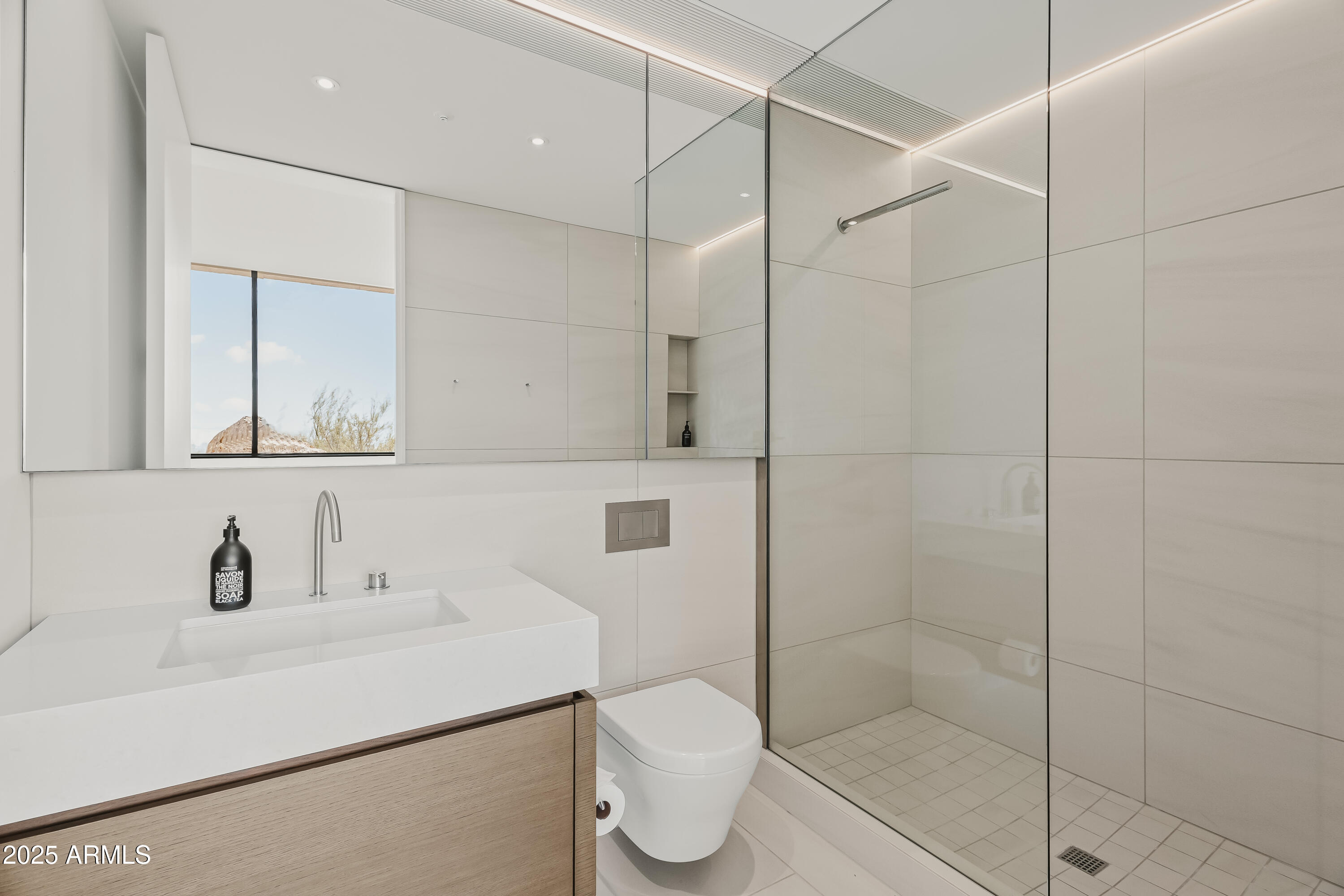 4301 East Upper Ridge Way Paradise Valley, AZ 85253 - Photo 27 of 53 a bathroom with a sink toilet and shower