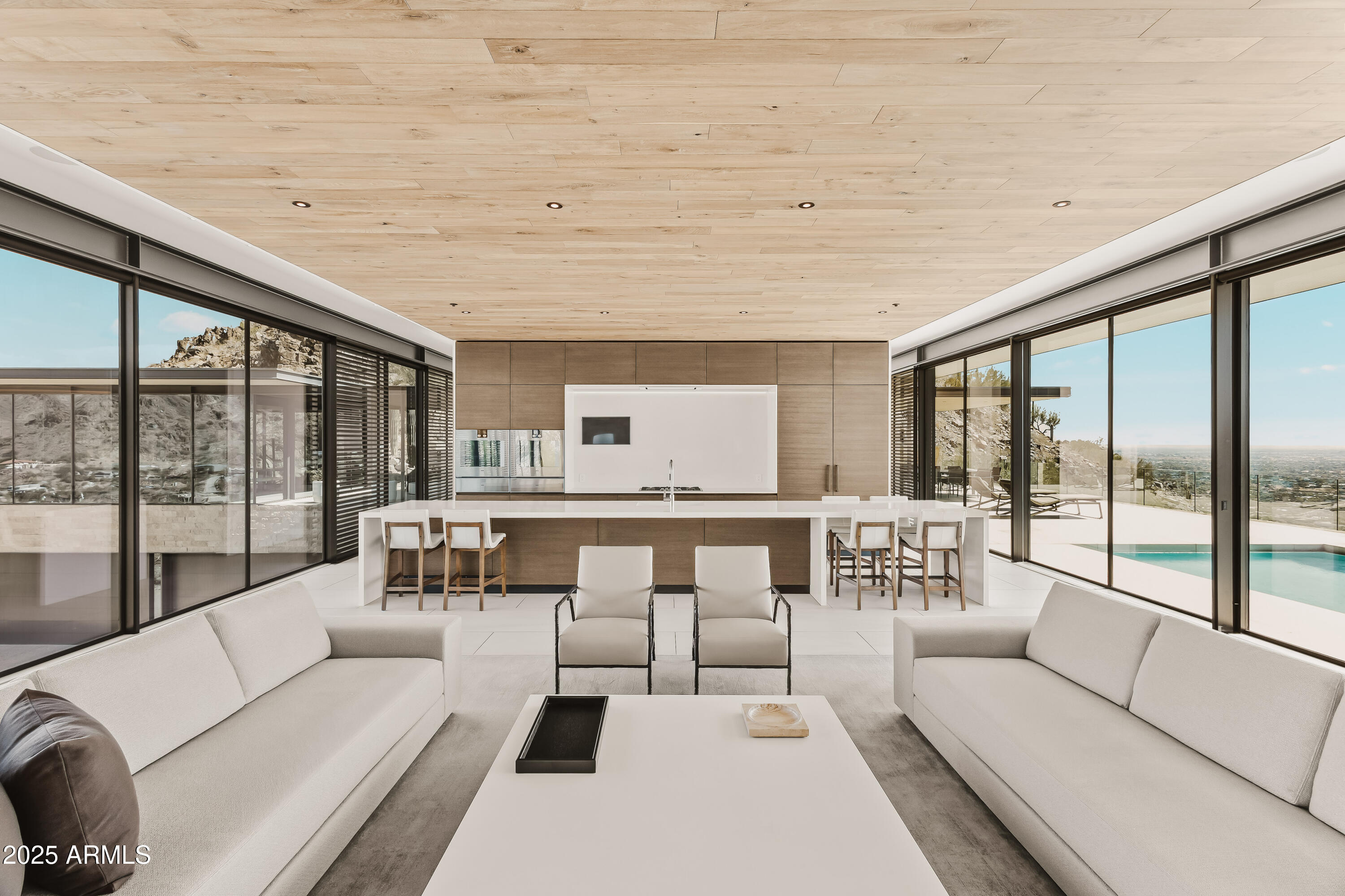 4301 East Upper Ridge Way Paradise Valley, AZ 85253 - Photo 3 of 53 a living room with furniture and floor to ceiling windows