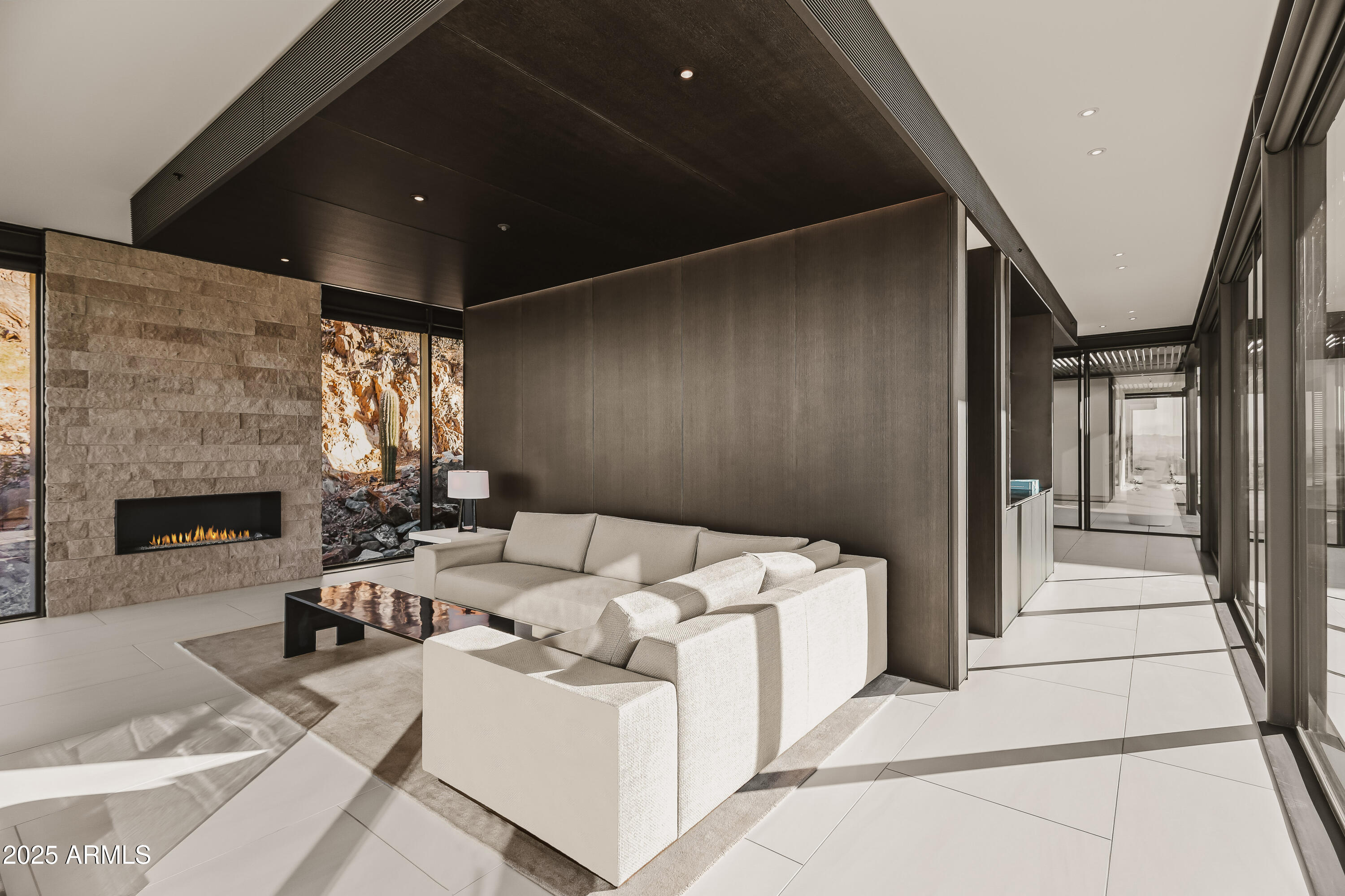 4301 East Upper Ridge Way Paradise Valley, AZ 85253 - Photo 32 of 53 a view of a livingroom with furniture and a fireplace