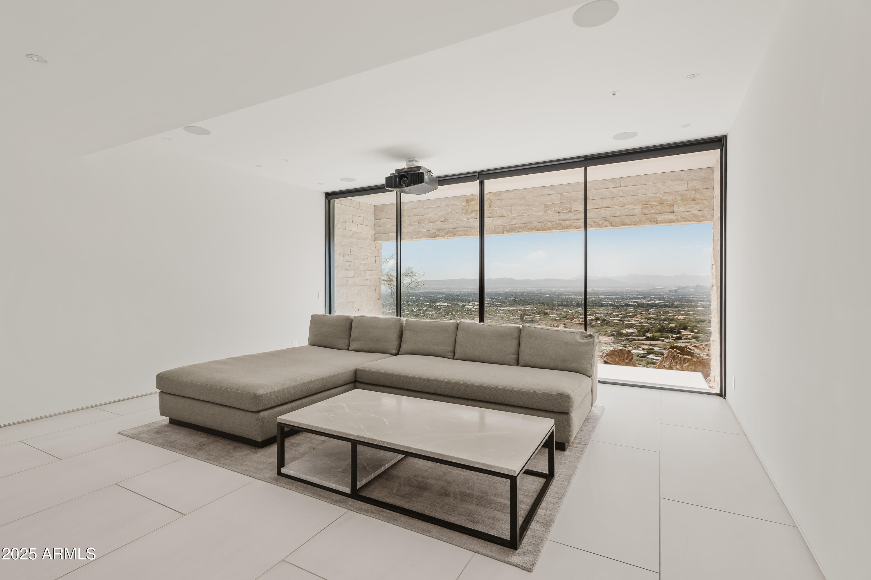 4301 East Upper Ridge Way Paradise Valley, AZ 85253 - Photo 33 of 53 a living room with furniture and a large window