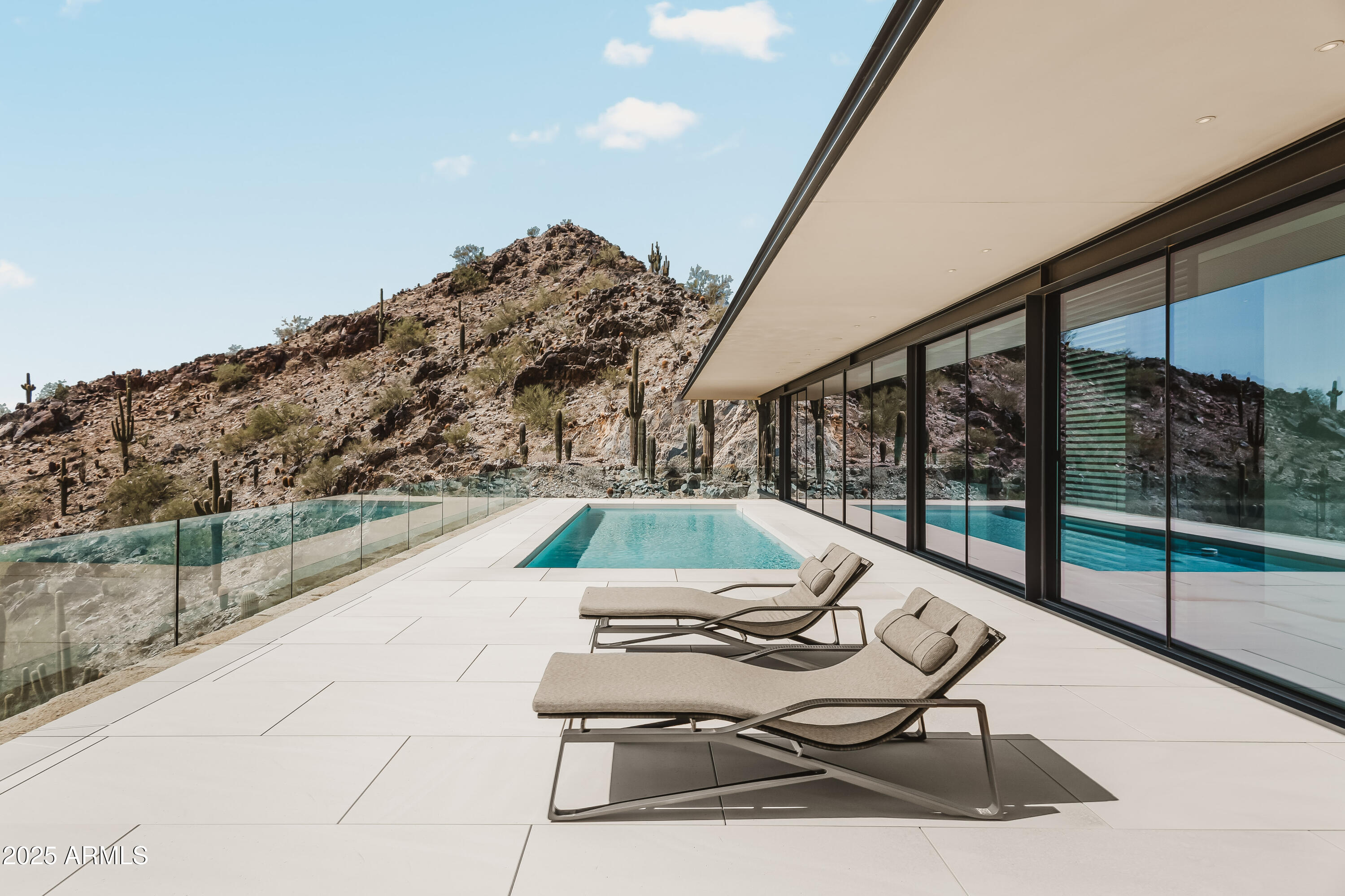 4301 East Upper Ridge Way Paradise Valley, AZ 85253 - Photo 36 of 53 a view of swimming pool with patio