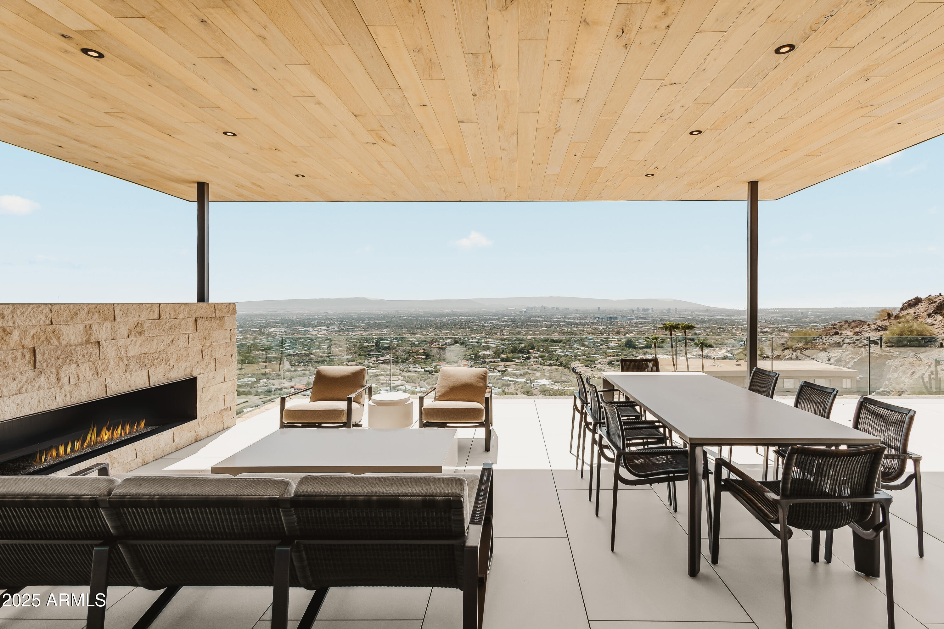 4301 East Upper Ridge Way Paradise Valley, AZ 85253 - Photo 40 of 53 a view of a terrace with furniture and stove