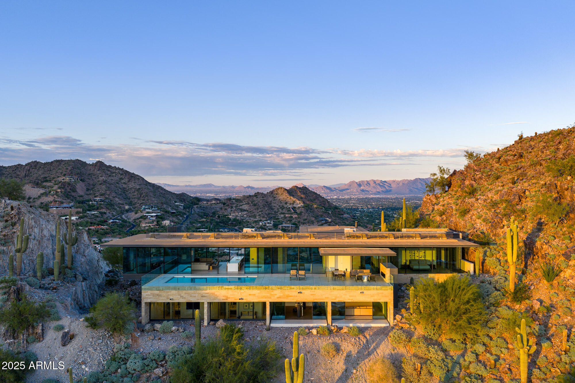 4301 East Upper Ridge Way Paradise Valley, AZ 85253 - Photo 44 of 53 a view of a large building with a mountain