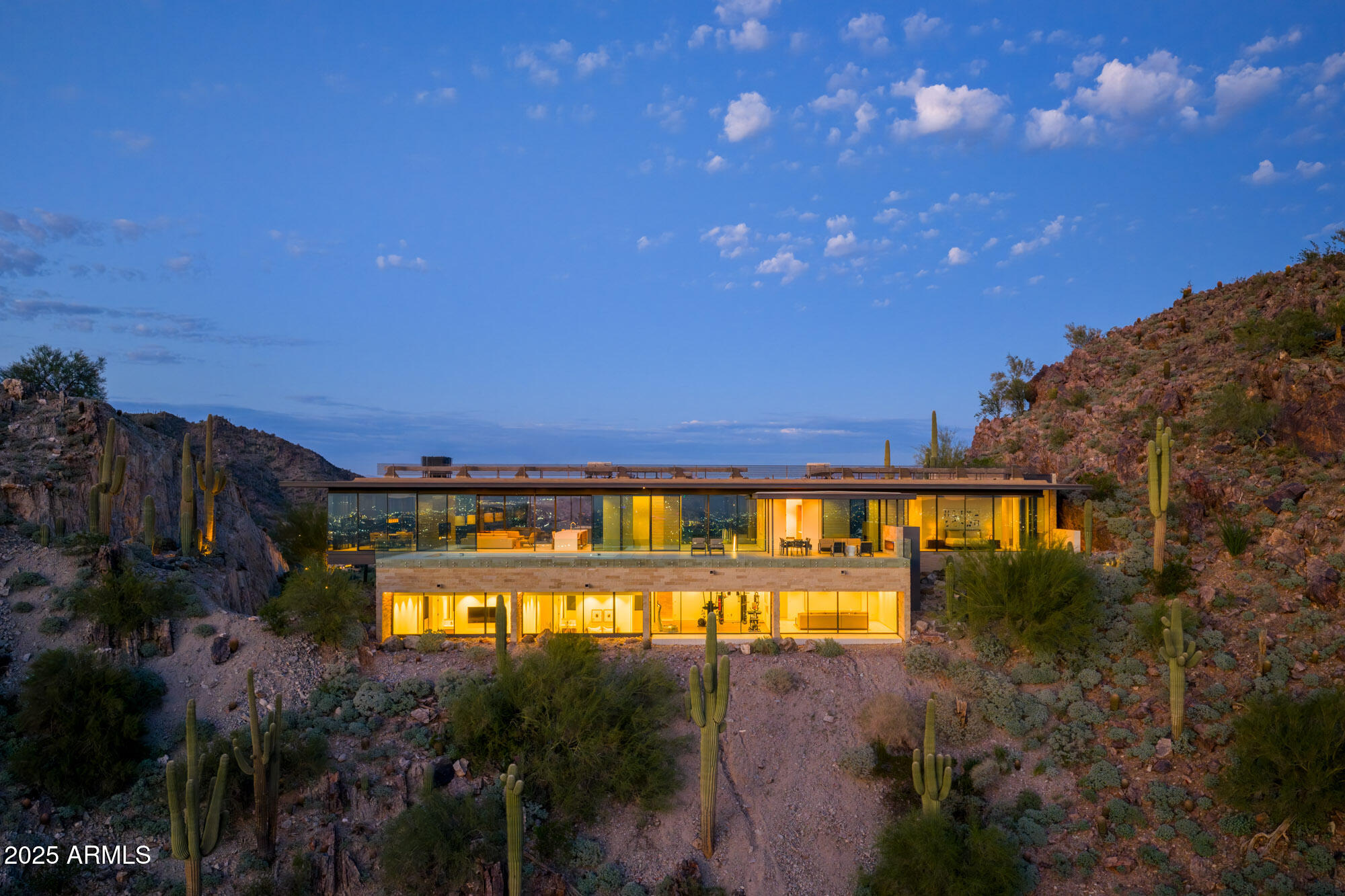 4301 East Upper Ridge Way Paradise Valley, AZ 85253 - Photo 47 of 53 a view of a swimming pool with an outdoor space and seating area