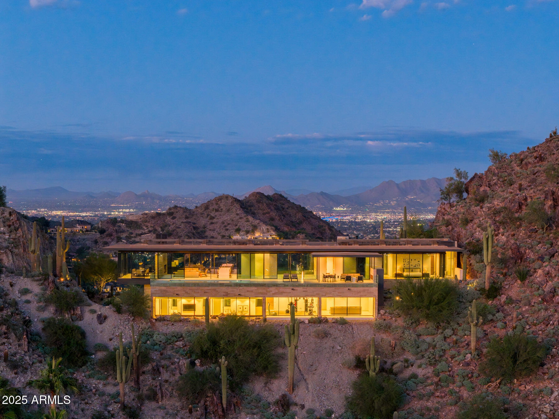 4301 East Upper Ridge Way Paradise Valley, AZ 85253 - Photo 48 of 53 a view of a building with mountains in the background