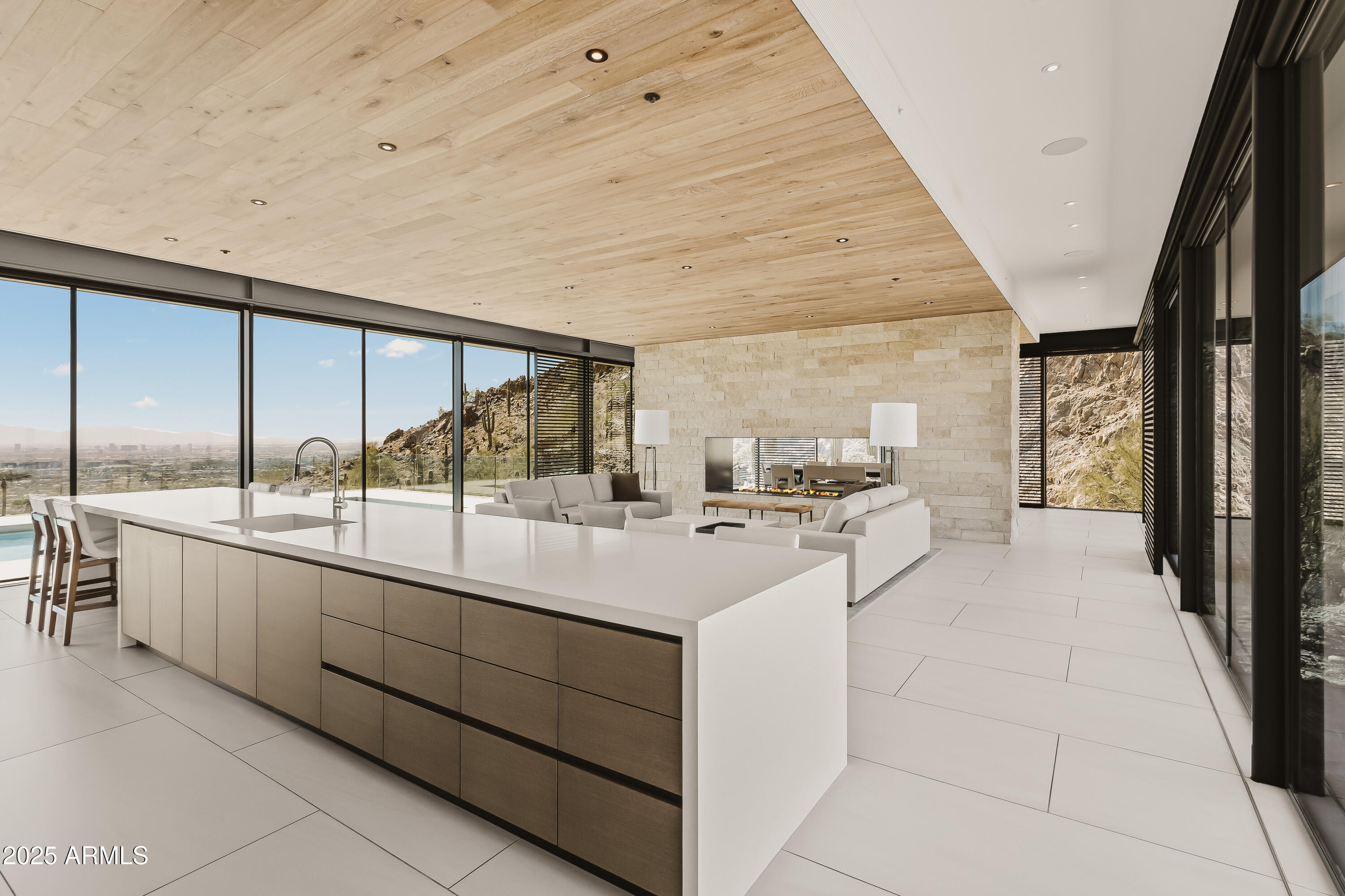 4301 East Upper Ridge Way Paradise Valley, AZ 85253 - Photo 7 of 53 a large white kitchen with a large window