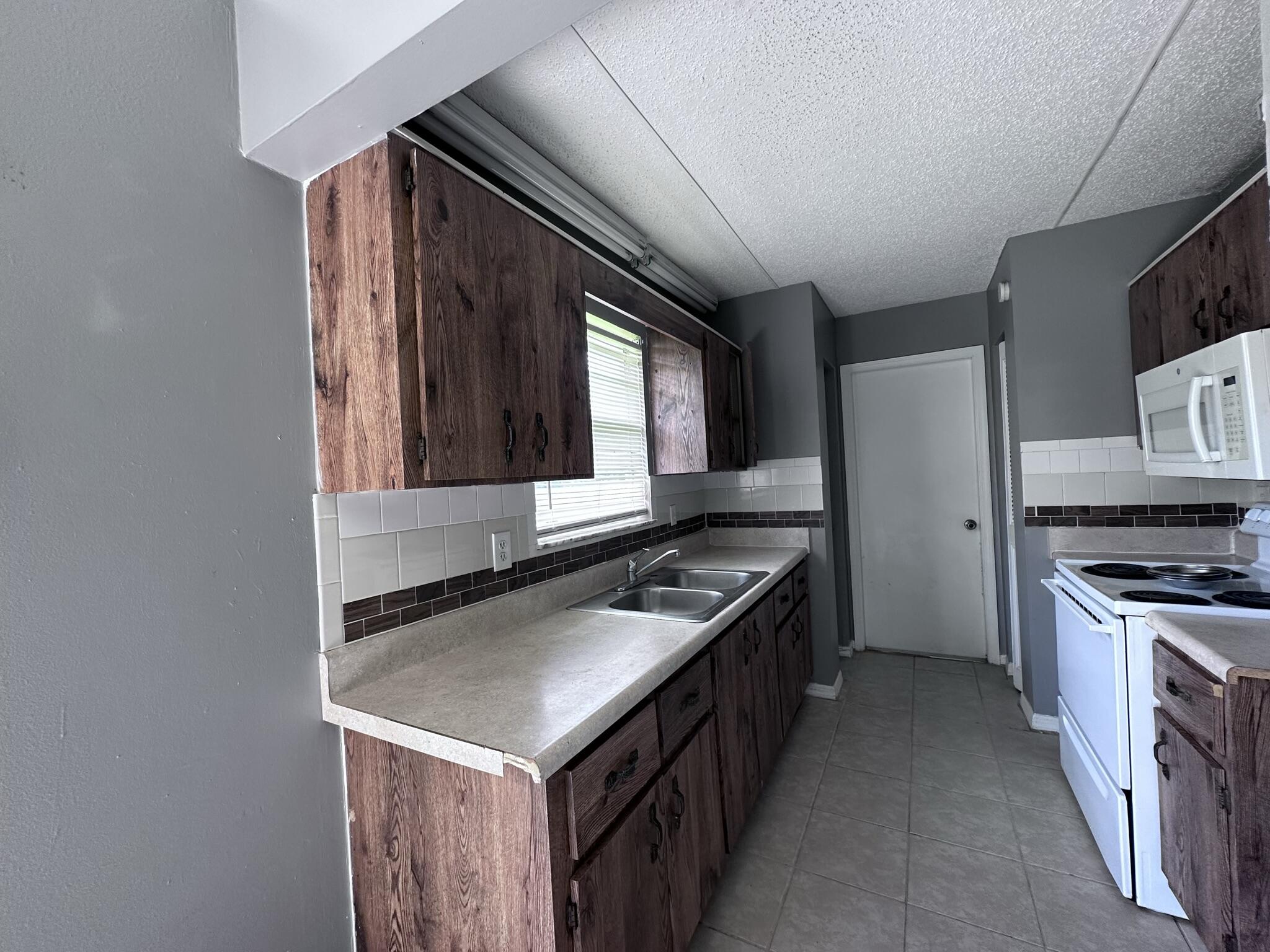 1962 Southwest Capri Street Port St. Lucie, FL 34953 - Photo 5 of 26 IMG_5217