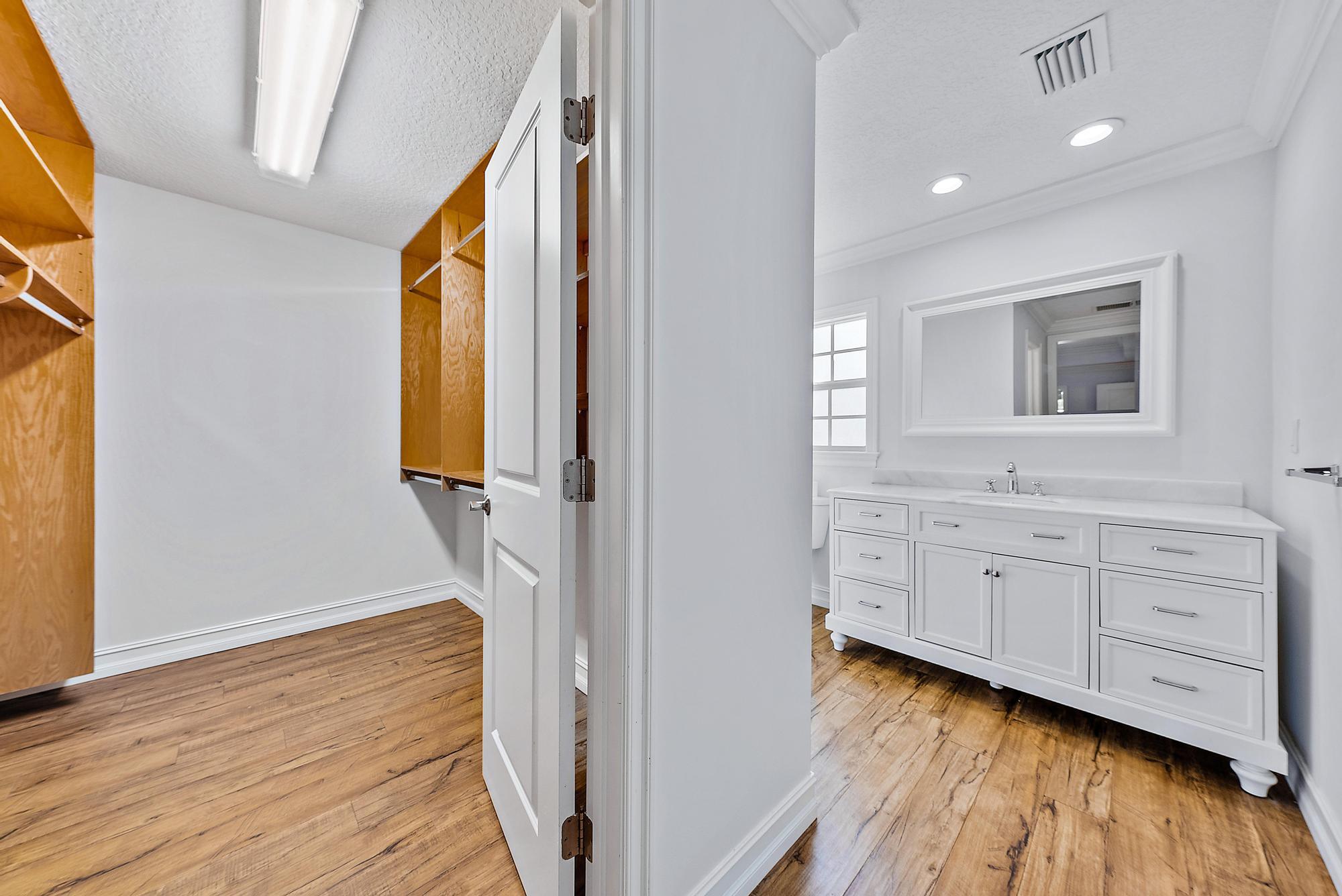 5791 Roebuck Road Jupiter, FL 33458 - Photo 15 of 23 Primary Closet & Bath