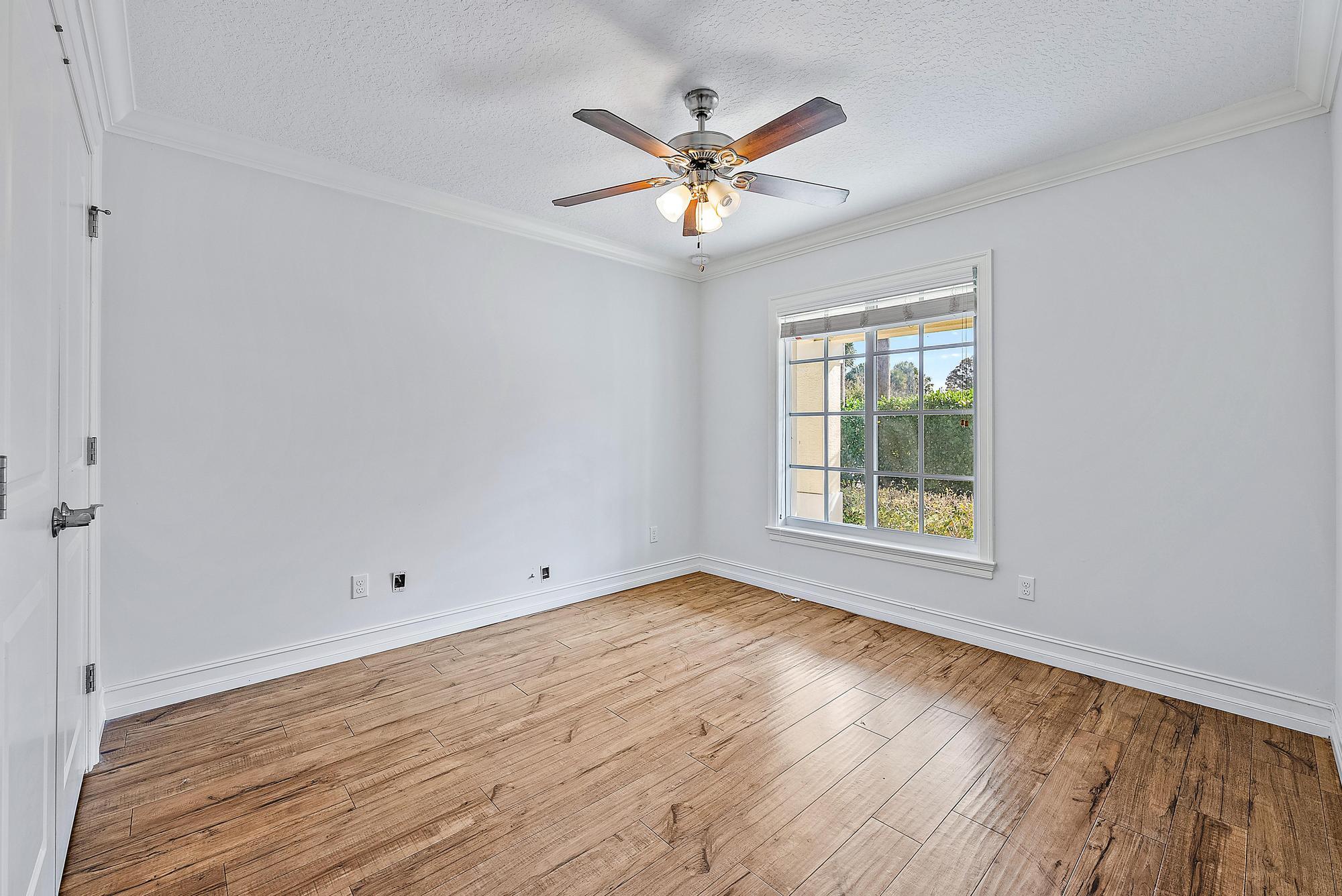 5791 Roebuck Road Jupiter, FL 33458 - Photo 17 of 23 Guest Bedroom