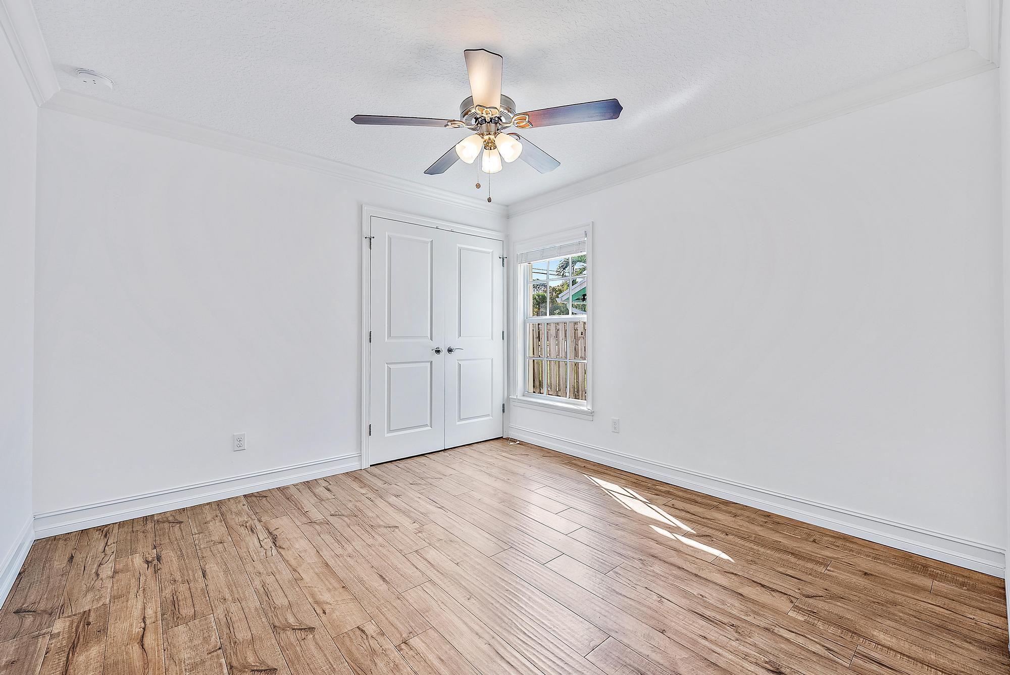 5791 Roebuck Road Jupiter, FL 33458 - Photo 20 of 23 Guest Bedroom