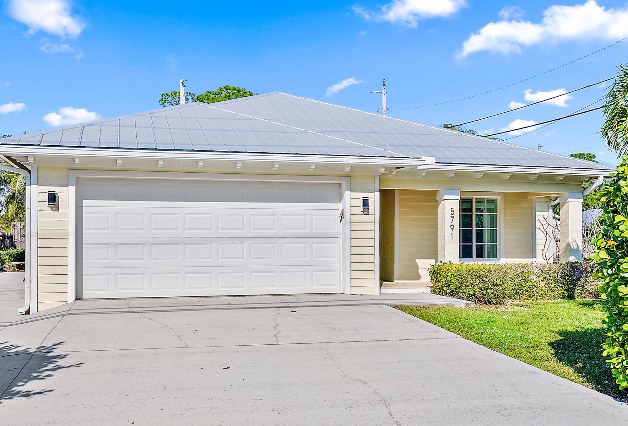 5791 Roebuck Road Jupiter, FL 33458 - Photo 2 of 23 Front