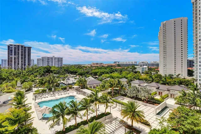 a view of a city with tall buildings