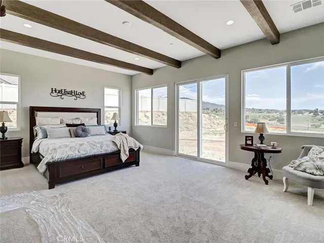 a bedroom with a bed and a closet