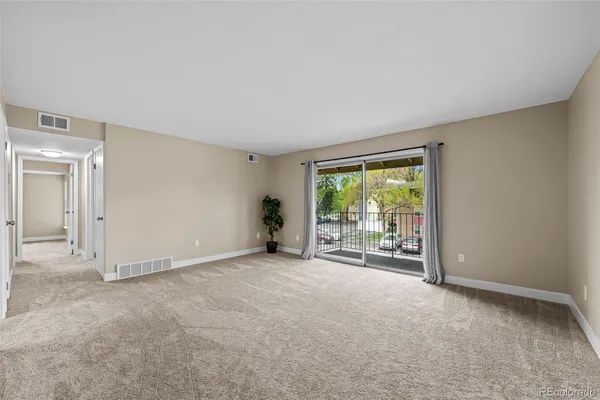 a view of empty room with front door